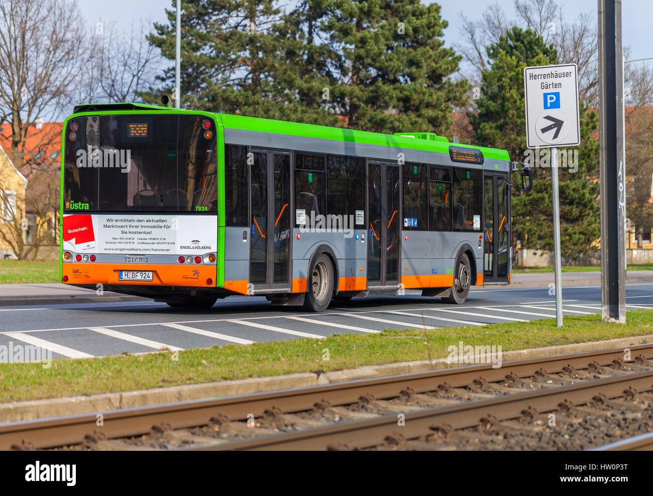 HANNOVER / GERMANY - MARCH 12, 2017: regular bus from UESTRA drives on route to the next stop. UESTRA is the operator of public transport in the city  Stock Photo