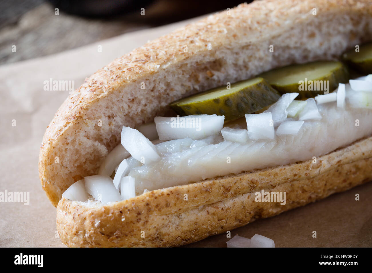 Pickled herring sandwich, popular snack in Netherlands Stock Photo Alamy