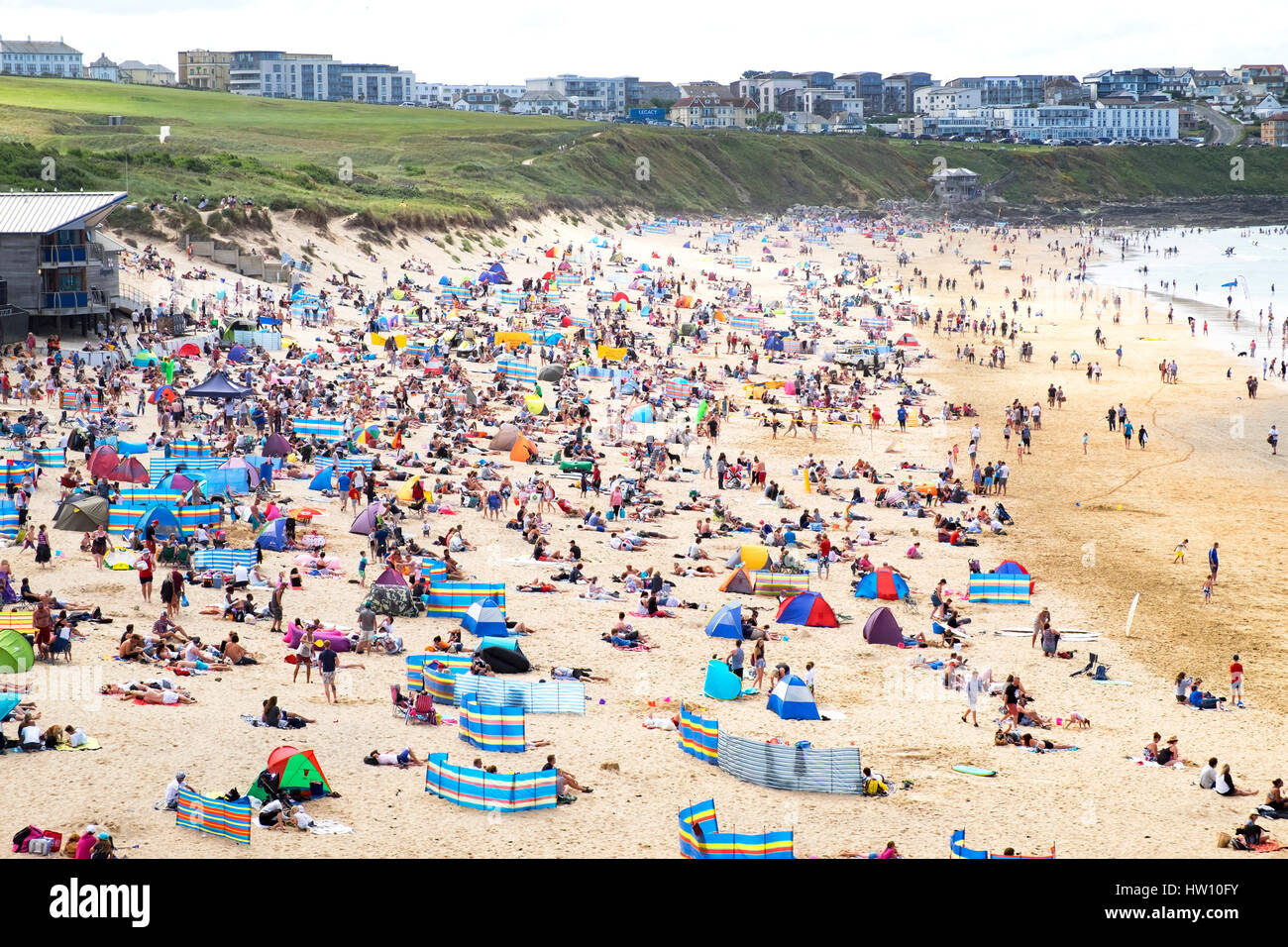 a packed fistral beach in the summer at newquay, cornwall, uk Stock Photo