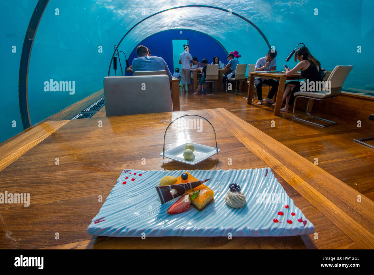 Maldives, Rangali Island. Conrad Hilton Resort. Ithaa underwater restaurant, dessert. (MR) Stock Photo