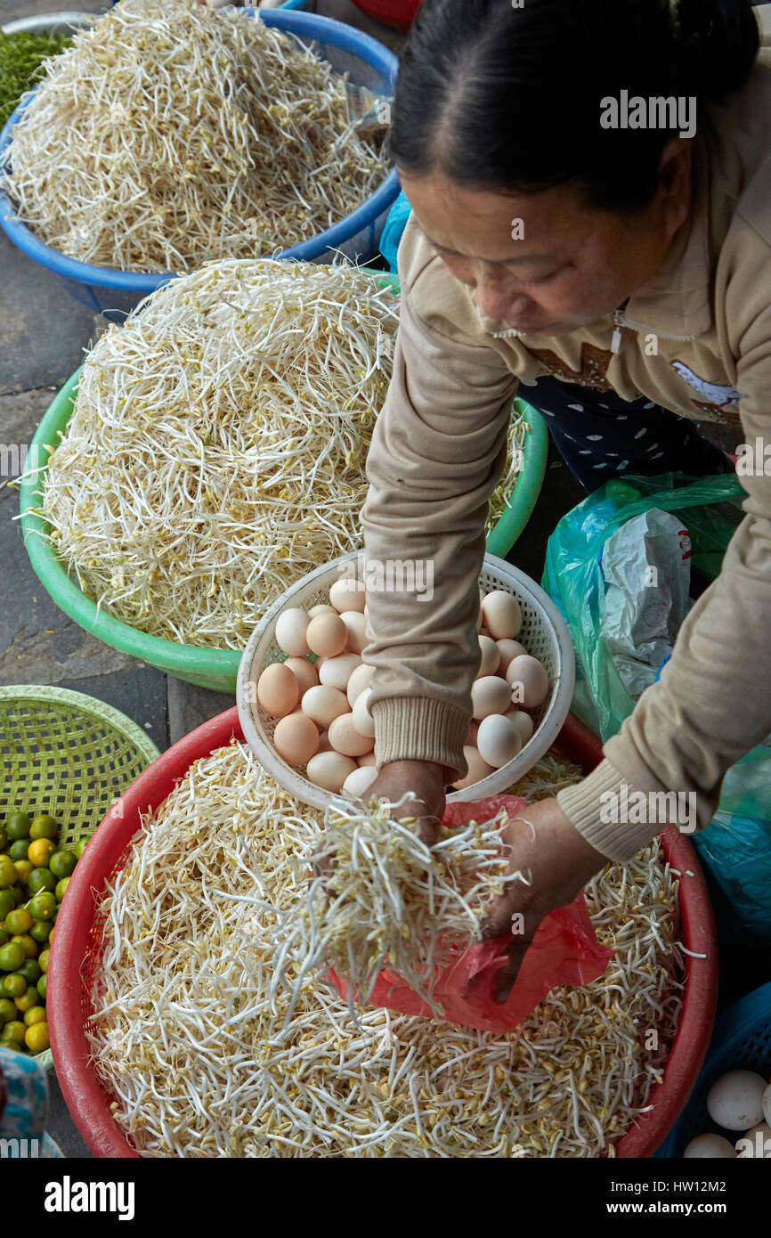 Woman selling eggs and bean sprouts, Central Market, Hoi An (UNESCO