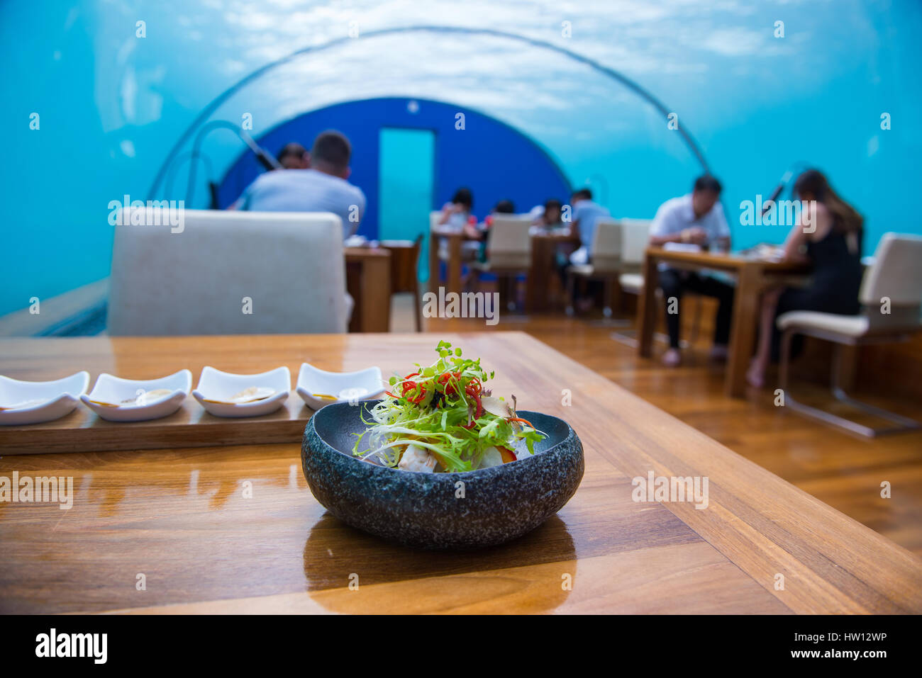 Maldives, Rangali Island. Conrad Hilton Resort. Salad at Ithaa underwater restaurant. Stock Photo