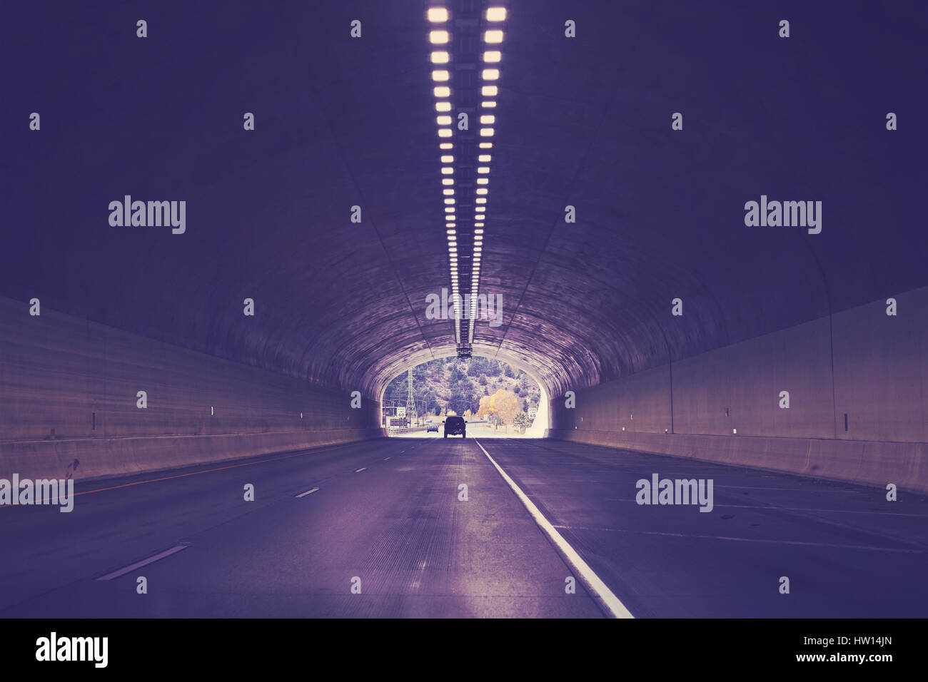 Tunnel on interstate highway 70, color toned picture, Colorado, USA