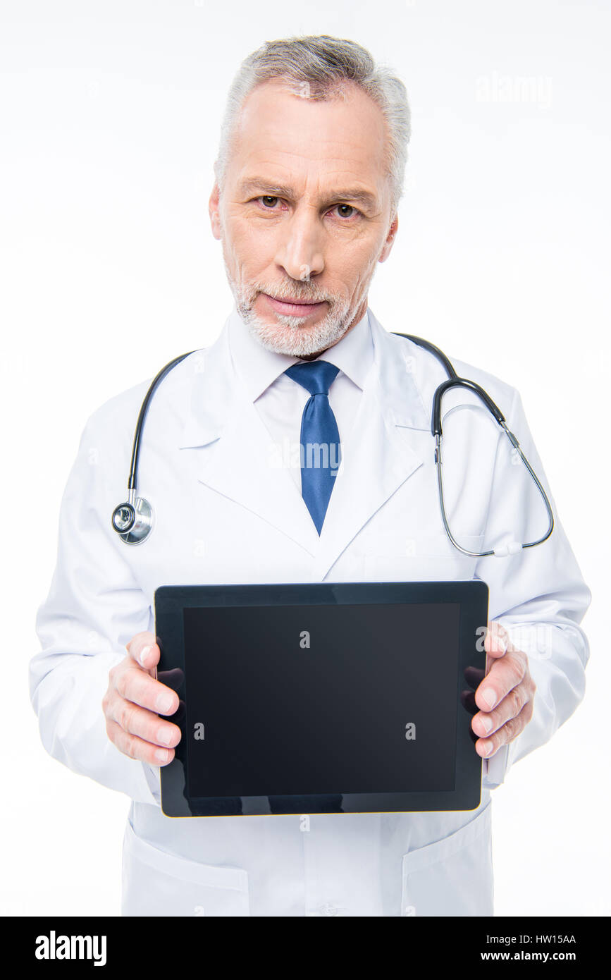 Doctor holding digital tablet Stock Photo - Alamy