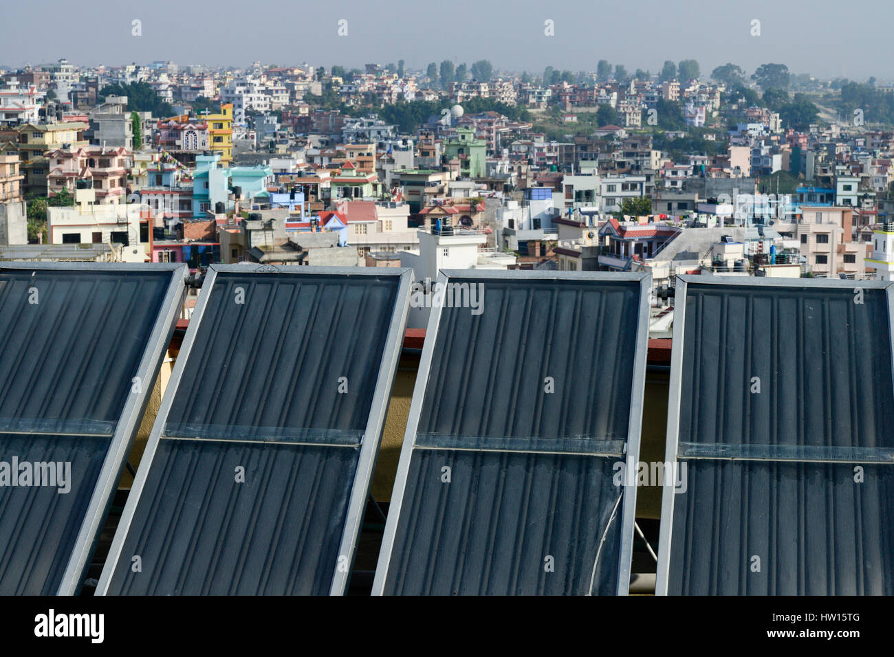 NEPAL Kathmandu, appartment building with solar collector for water heating / Haus mit Sonnenkollektor fuer Warmwasseraufbereitung Stock Photo