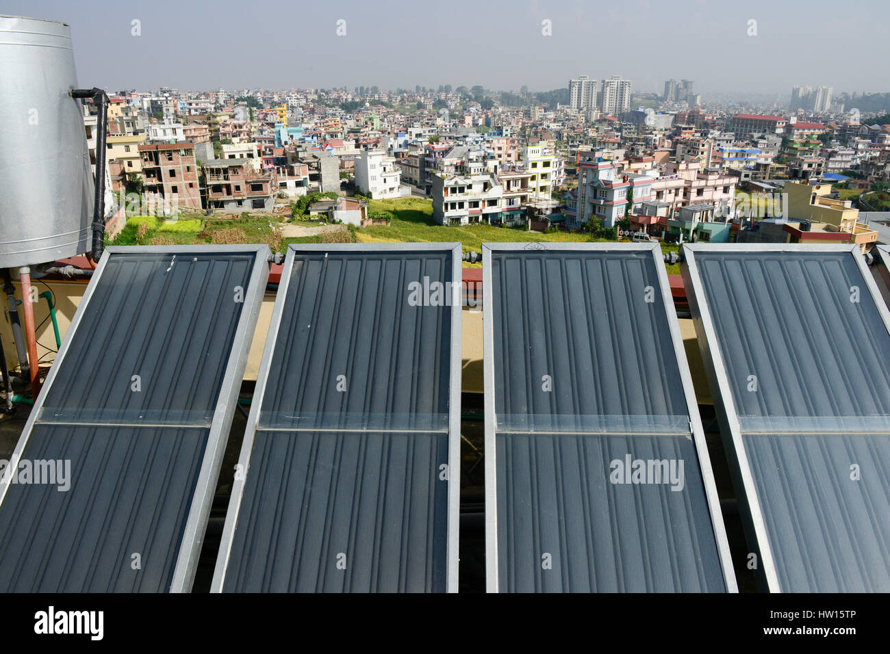 NEPAL Kathmandu, appartment building with solar collector for water heating / Haus mit Sonnenkollektor fuer Warmwasseraufbereitung Stock Photo