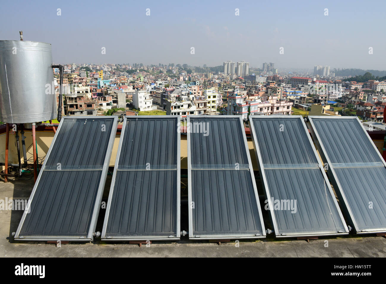 NEPAL Kathmandu, appartment building with solar collector for water heating / Haus mit Sonnenkollektor fuer Warmwasseraufbereitung Stock Photo