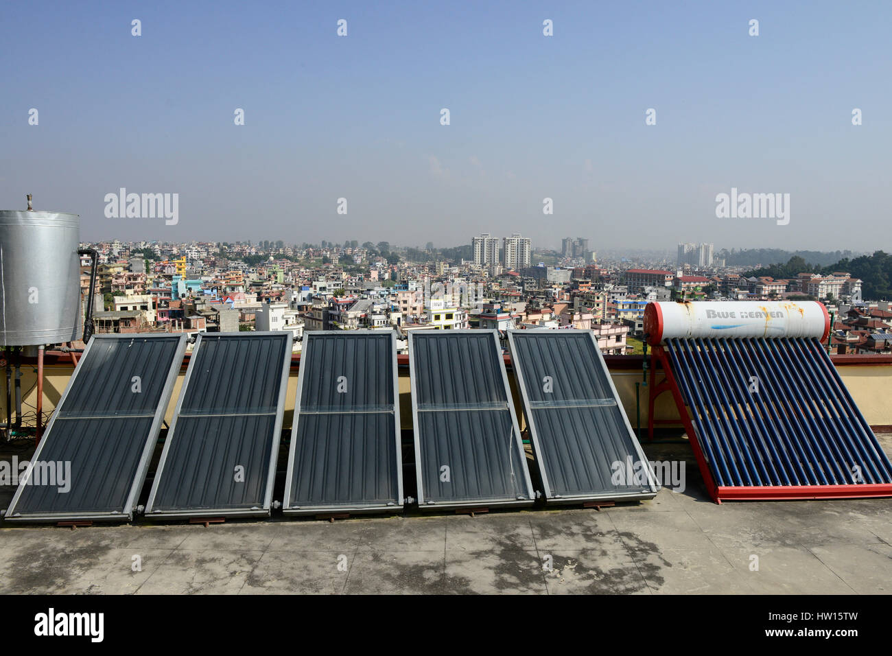 NEPAL Kathmandu, appartment building with solar collector for water heating / Haus mit Sonnenkollektor fuer Warmwasseraufbereitung Stock Photo