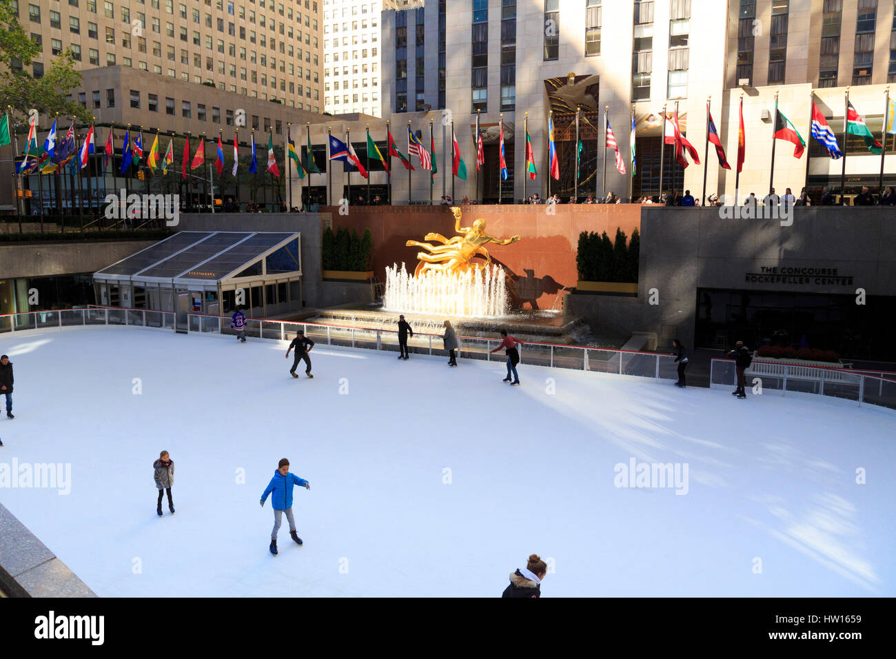 USA, New York, New York City, Manhattan, Rockefeller Center, Ice Rink, Prometheus Statue Stock Photo