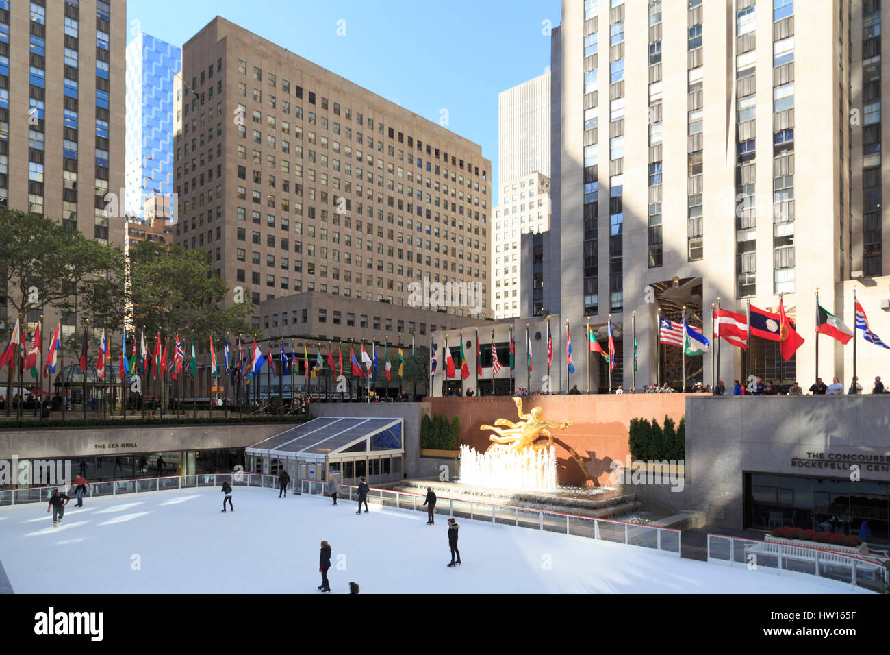 USA, New York, New York City, Manhattan, Rockefeller Center, Ice Rink, Prometheus Statue Stock Photo