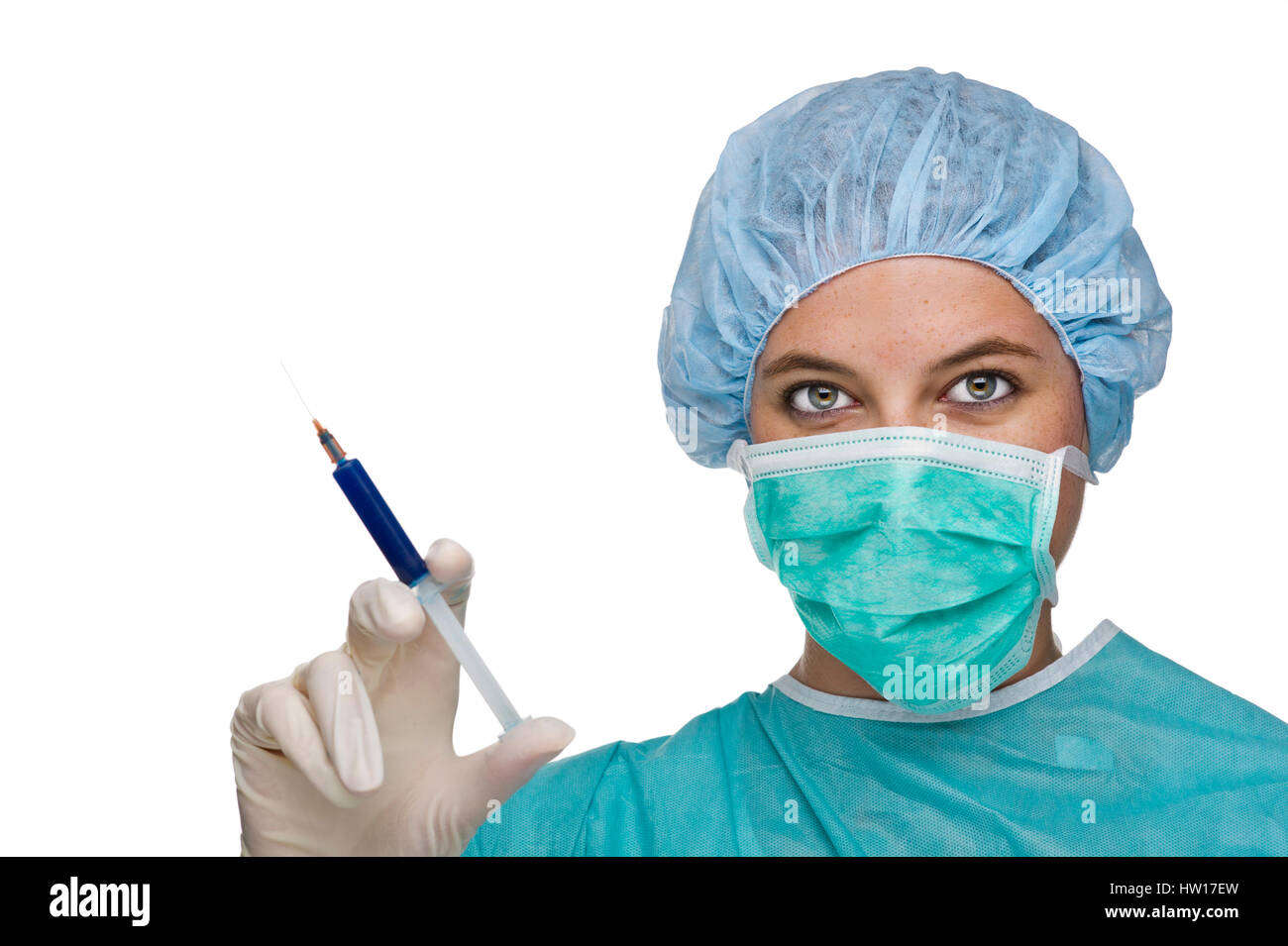 OP Doctor with syringe in the hand, OP ƒrztin mit Spritze in der Hand Stock Photo