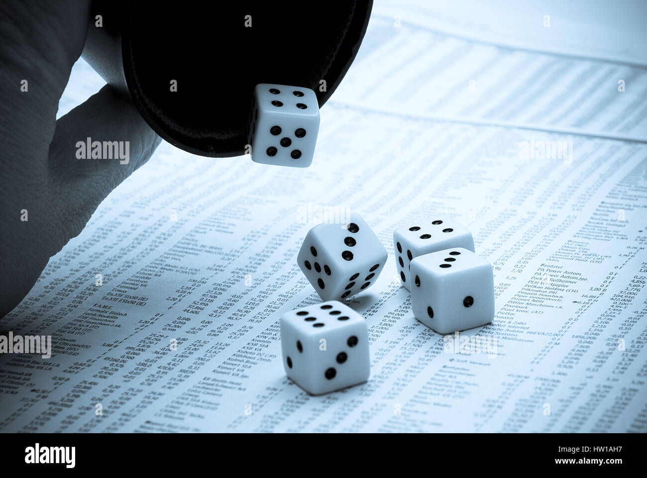 Dice cup with falling cube, W¸rfelbecher mit fallenden W¸rfel Stock Photo