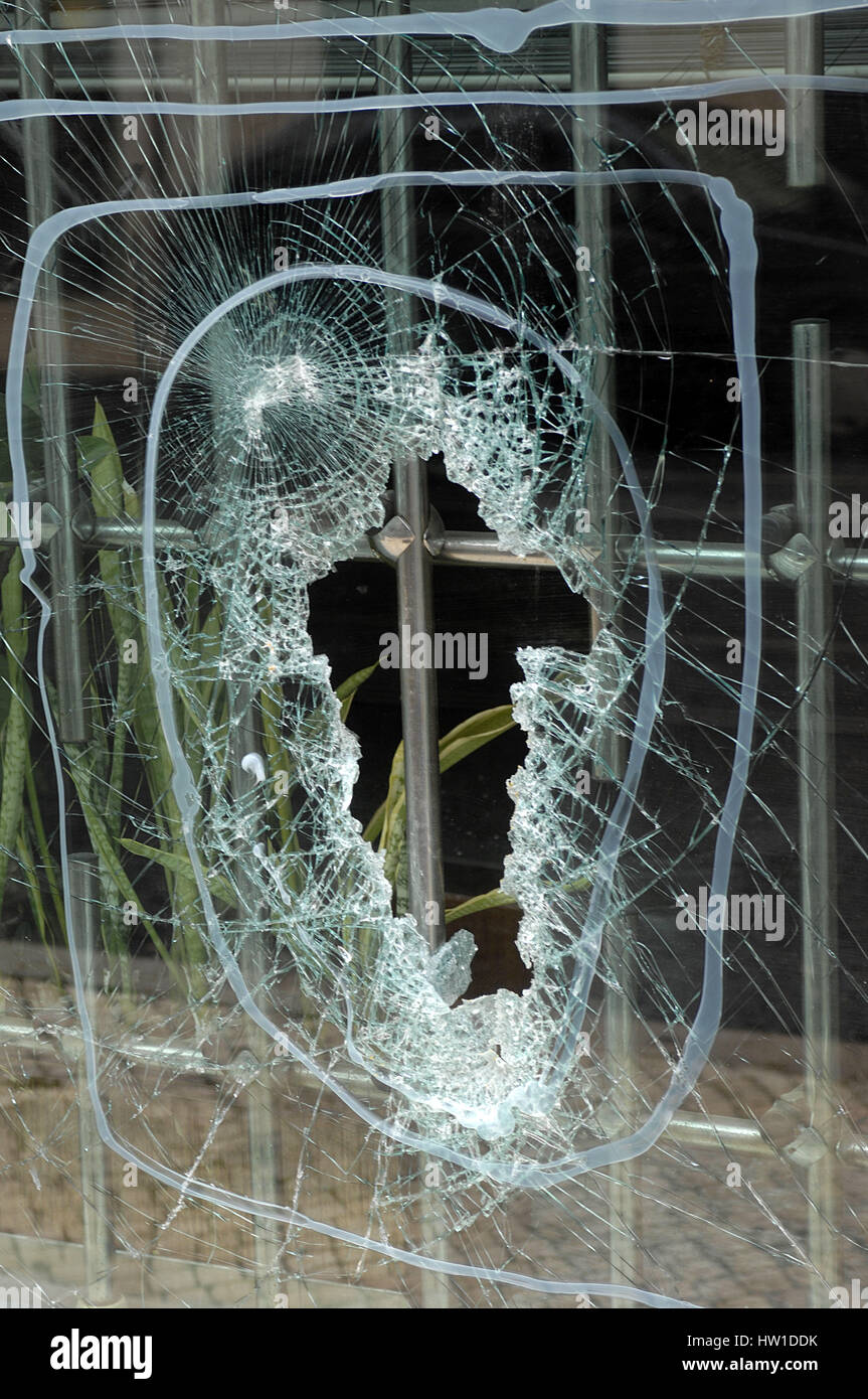 Smashed window pane, Eingeschlagenen Fensterscheibe Stock Photo
