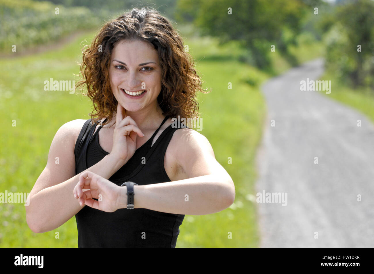 Woman with pulse clock, Frau mit Pulsuhr Stock Photo