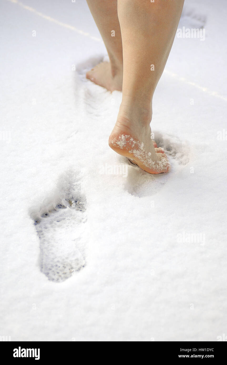 Barefoot in the snow, Barfuß im Schnee Stock Photo