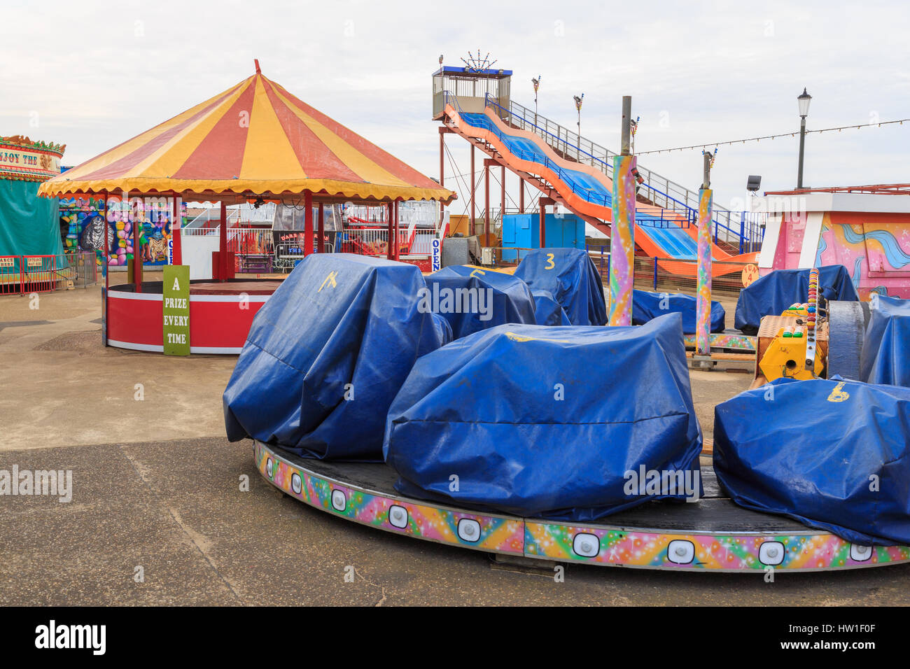 HUNSTANTON, ENGLAND - MARCH 10: Hunstanton fairground rides during closed/off time. In Hunstanton, Norfolk, England. On 10th March 2017. Stock Photo