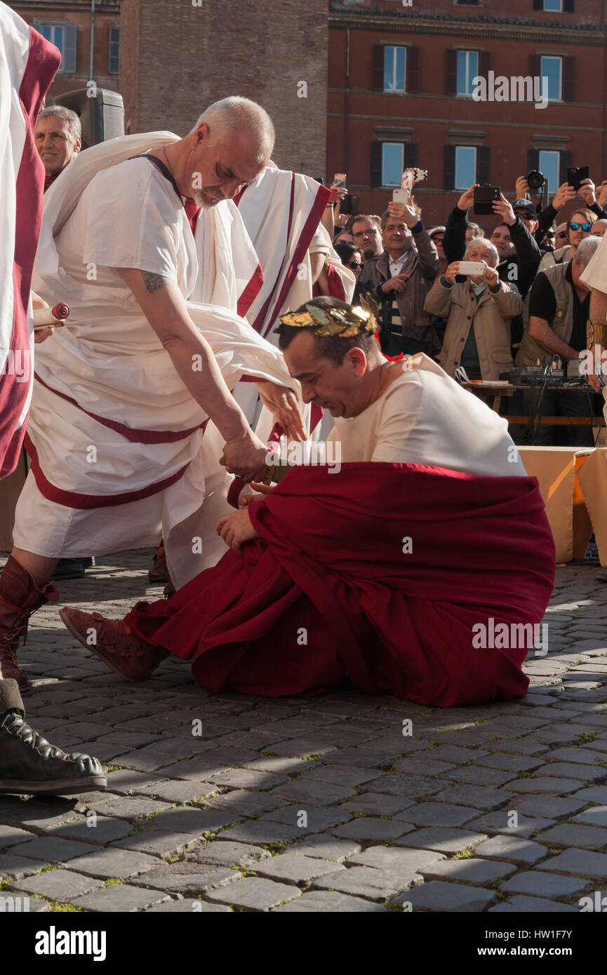 Rome, Italy. 15th Mar, 2017. Opposite the place where Julius Caesar was assassinated by Brutus and other senators conspirators. The fourteenth edition of the historical re-enactment organized by Gruppo Storico Romano. The representation was concluded before the statue of Julius Caesar located at Via Dei Fori Imperiali. Credit: Leo Claudio De Petris/Pacific Press/Alamy Live News Stock Photo