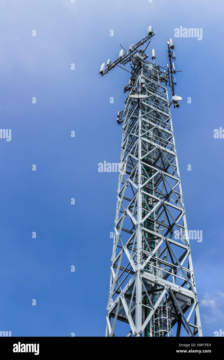 Telecommunications antenna for radio, television and telephony against clear sky Stock Photo