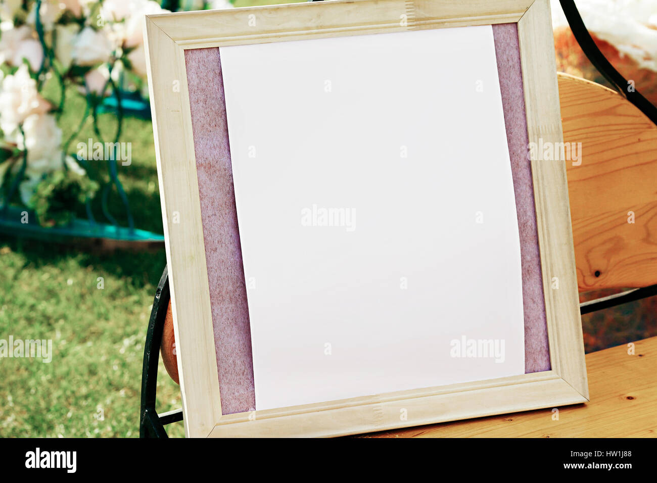 White photo frame on the table for wedding decoration Stock Photo Alamy