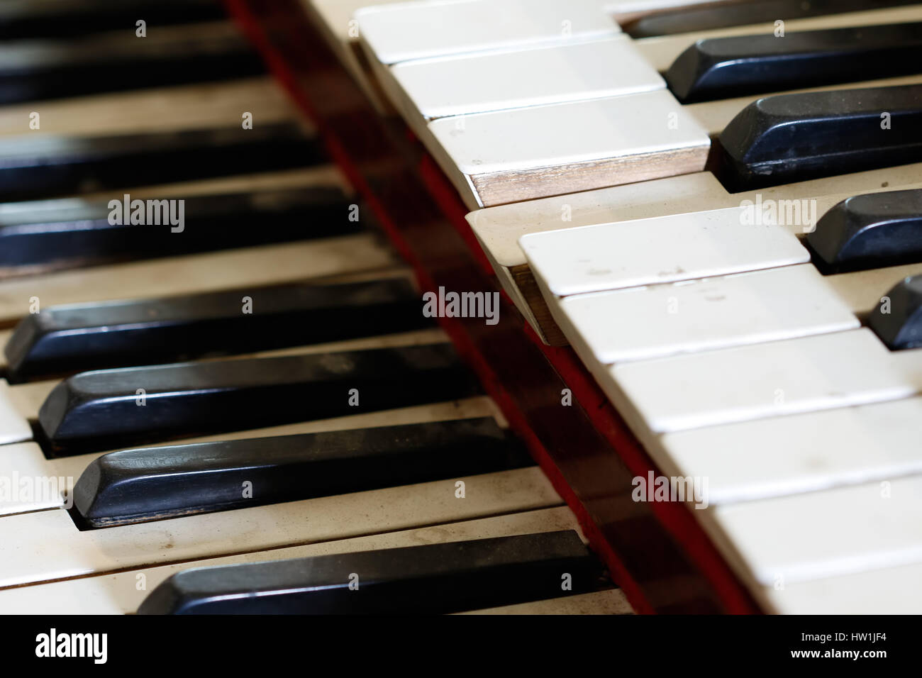 Abstract detail of old, broken and dusty organ keys Stock Photo