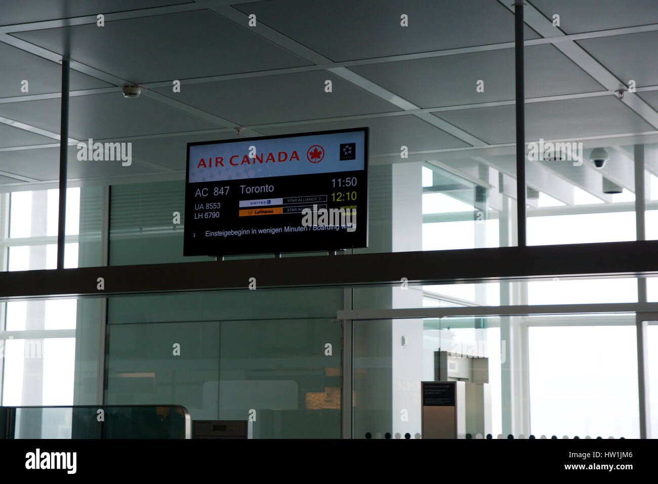 MUNICH, GERMANY - JAN 21st, 2017: Air Canada Boarding Gate at MUC airport for my Business Class flight to Toronto, depature screen. Stock Photo