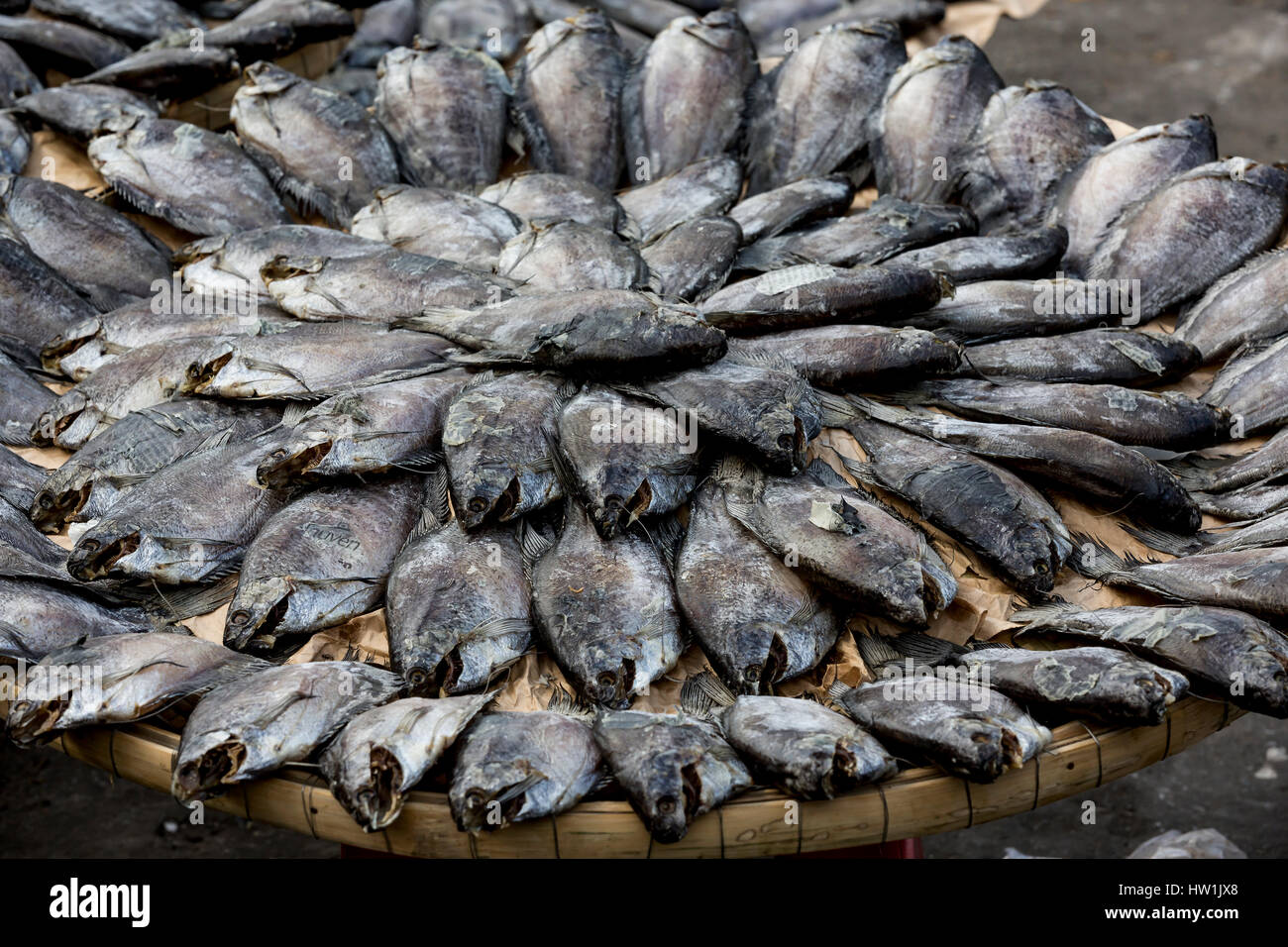 Basket of dry fish in a market in Ho Chi Minh City, Vietnam Stock Photo