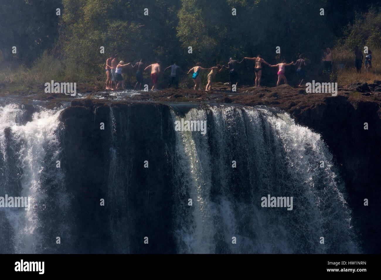 Tourists On Devil Pool In Victoria Falls On Zambezi River Discovered By David Livingstone In November 1855 Zimbabwe Stock Photo Alamy Tourists On Devil Pool In Victoria Falls On Zambezi River Discovered By David Livingstone In November 1855 Zimbabwe Stock Photo Alamy