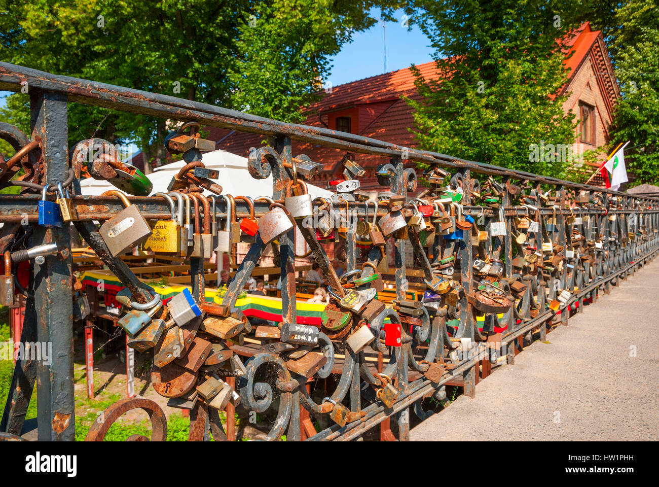 Bridge with padlocks in Vilnus, Lithuania at daytime. Summertime Stock