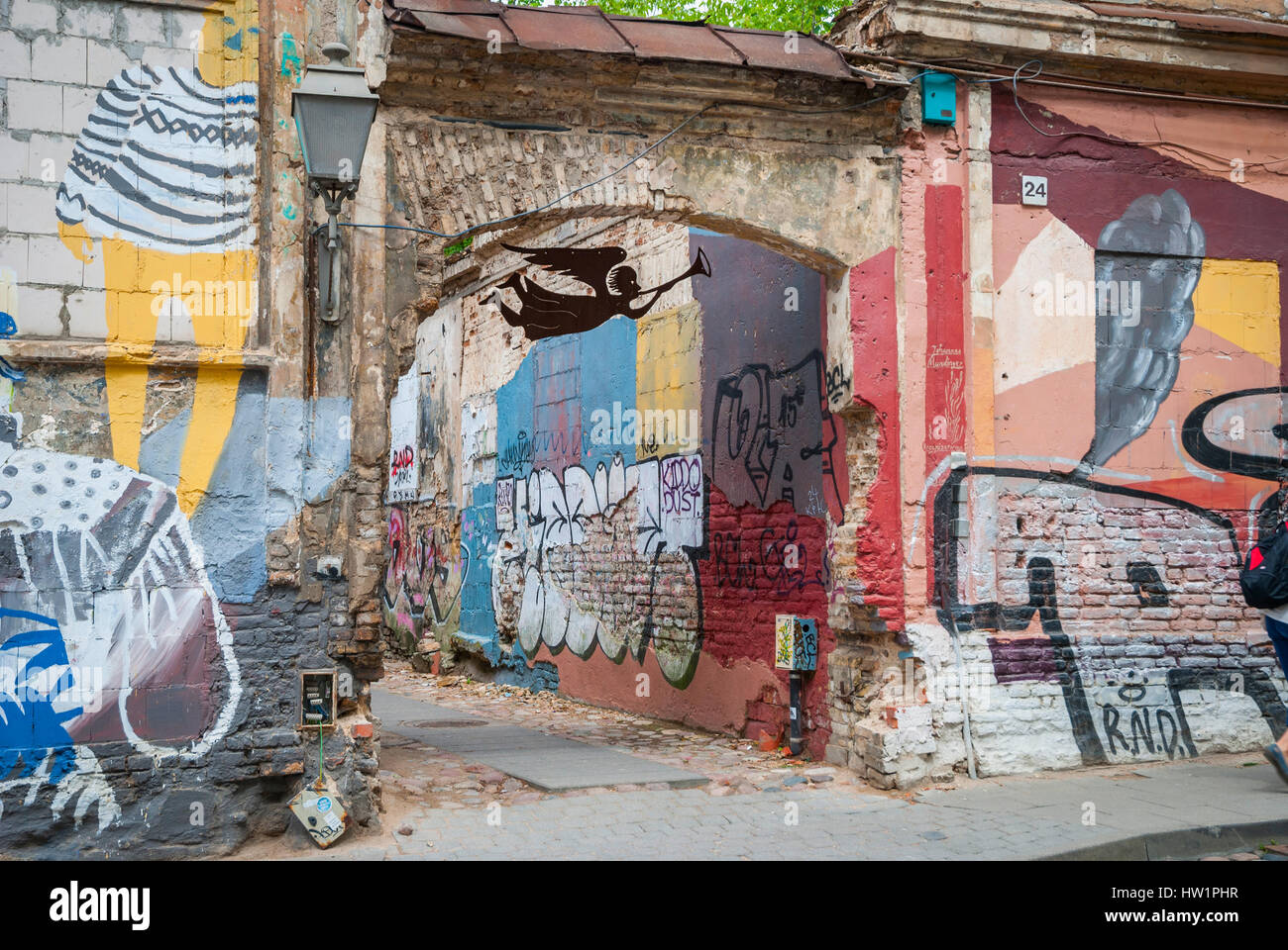 View on abandoned street with graffiti on walls Stock Photo