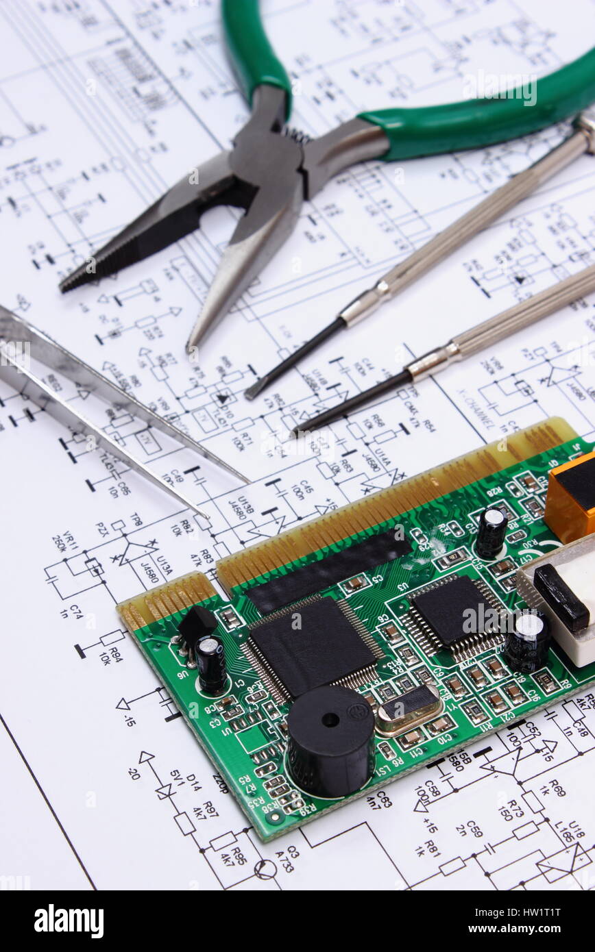Printed circuit board with electrical components and precision tools ...
