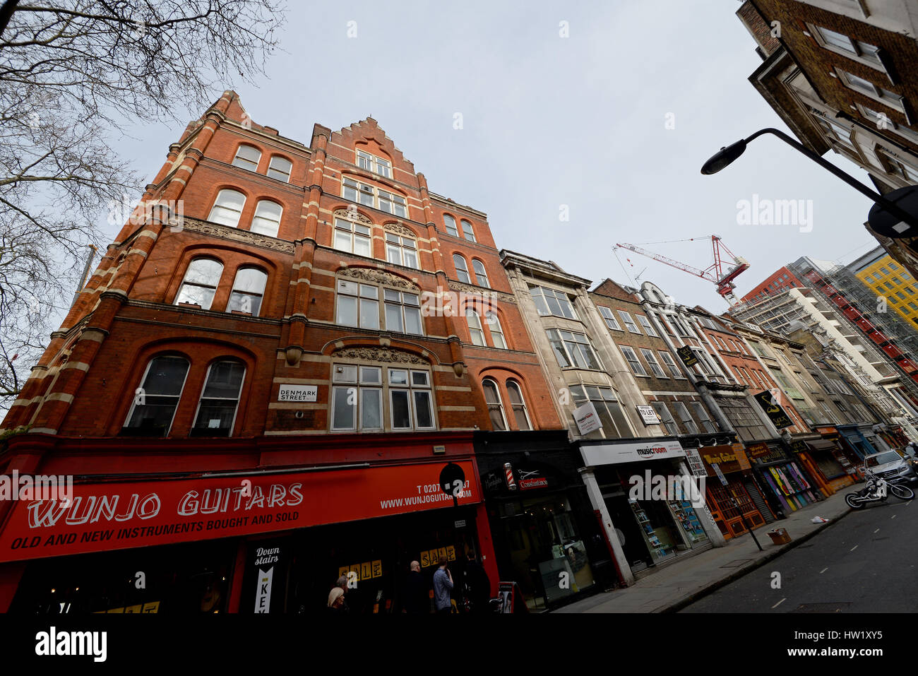 Denmark St is a street on the edge of London's West End running from Charing Cross Rd to St Giles.Since the 50s it has been associated with Brit music Stock Photo