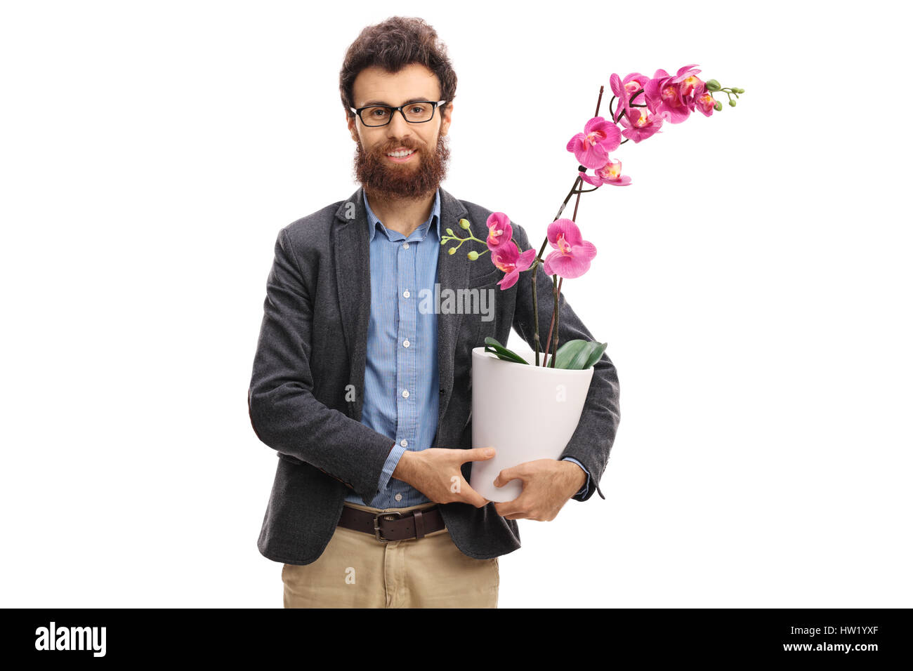 Man holding an orchid flower in a pot isolated on white background Stock Photo
