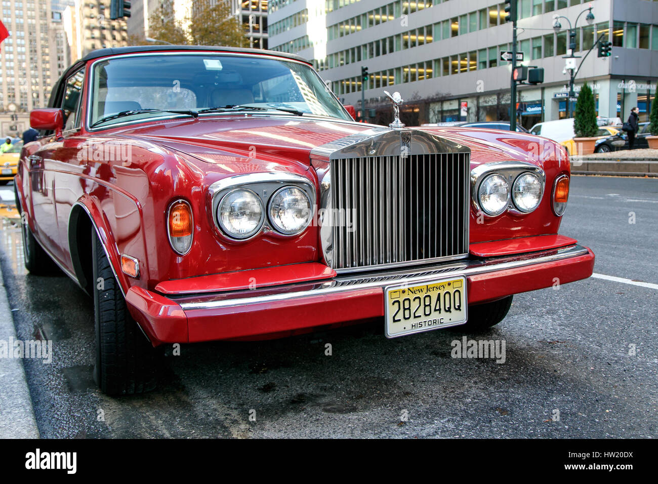 New York, December 1, 2016: A red Rolls Royce is parked on Park Avenue in Manhattan. Stock Photo