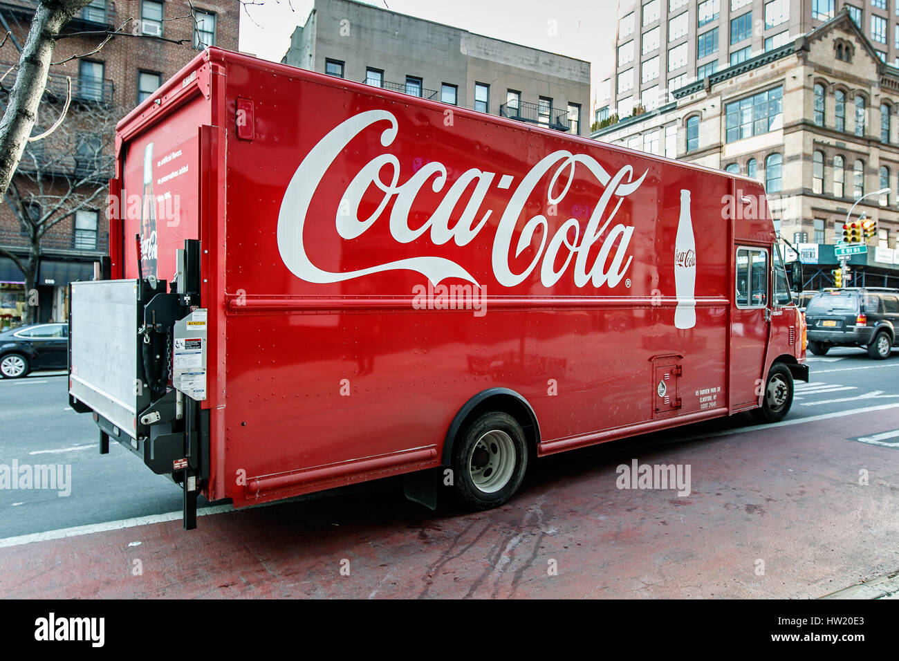 A Coca-Cola truck is pulling into traffic on First Avenue in Manhattan. Stock Photo