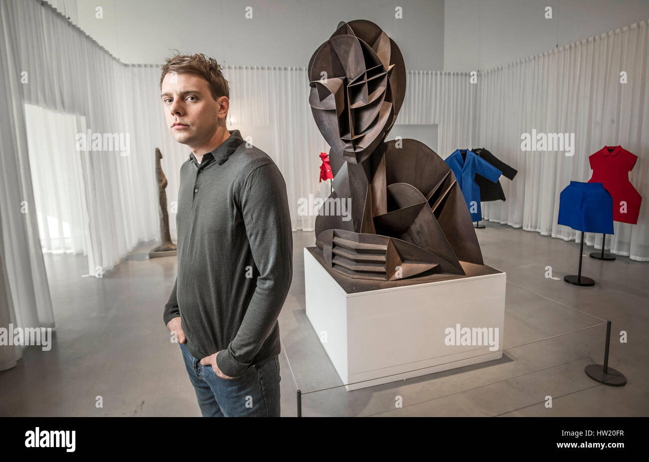 Fashion designer Jonathan Anderson in front of Head No. 2, 1916 by artist Naum Gabo, which features in the Disobedient Bodies: JW Anderson curates The Hepworth Wakefield exhibition at The Hepworth Wakefield art gallery in Yorkshire. Stock Photo