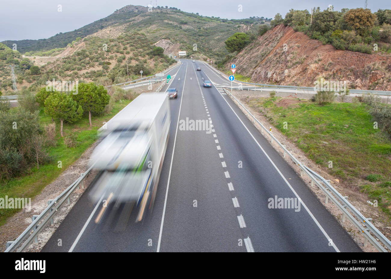 Truck moves at spanish national road with slow vehicles lane. Cerro Muriano, Cordoba Stock Photo