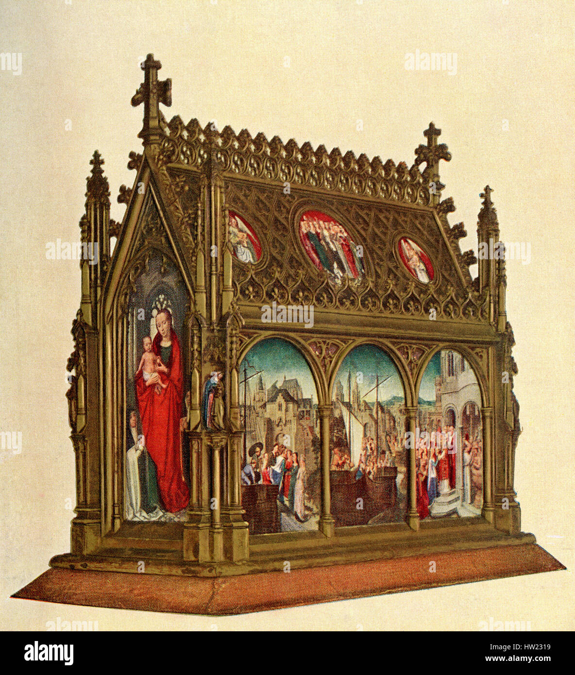 Virgin and Child, reverse of the Reliquary of Saint Ursula. The reliquary of Ursula was commissioned to Memling by the monastic community of Saint John Hospital, where the saint was the subject of special devotion. The wooden reliquary is made in the form of a chapel with a roof bâtière and shows Ursula protecting the virgins, and arriving at Cologne, Basel and Rome. Stock Photo
