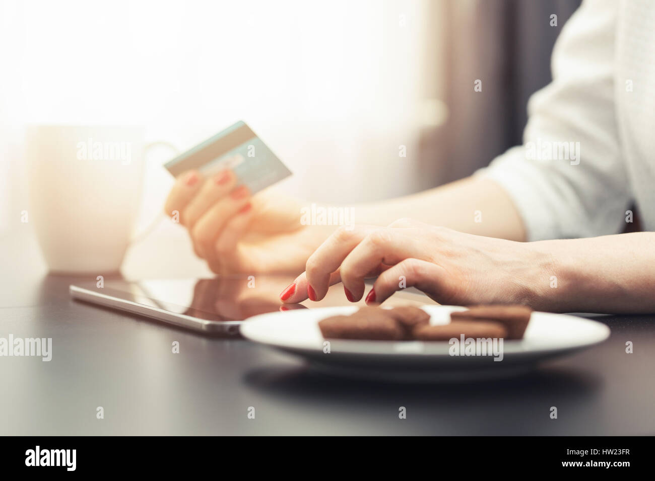 woman using digital tablet to make a payment with credit card Stock ...