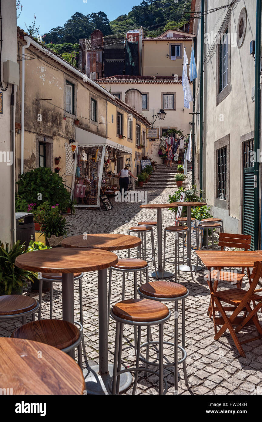 Portugal, Sintra. The architecture of the old town . The narrow , winding , cobbled stone streets abound with souvenir shops , small cafes and bars. Stock Photo
