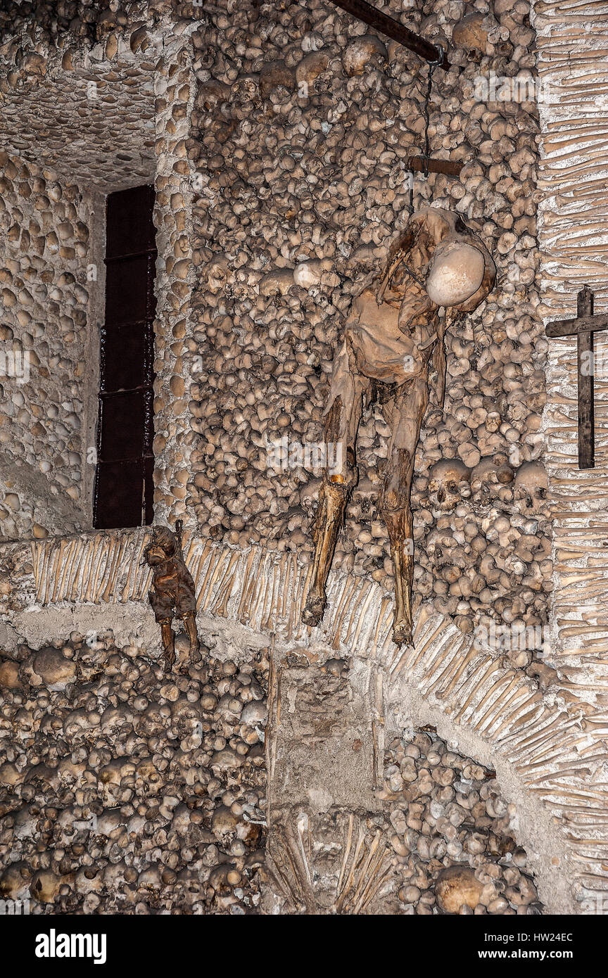 Portugal , Evora . Chapel of Bones - one of the most famous monuments of the city . Interior walls lined with human bones and skulls - about a thousan Stock Photo