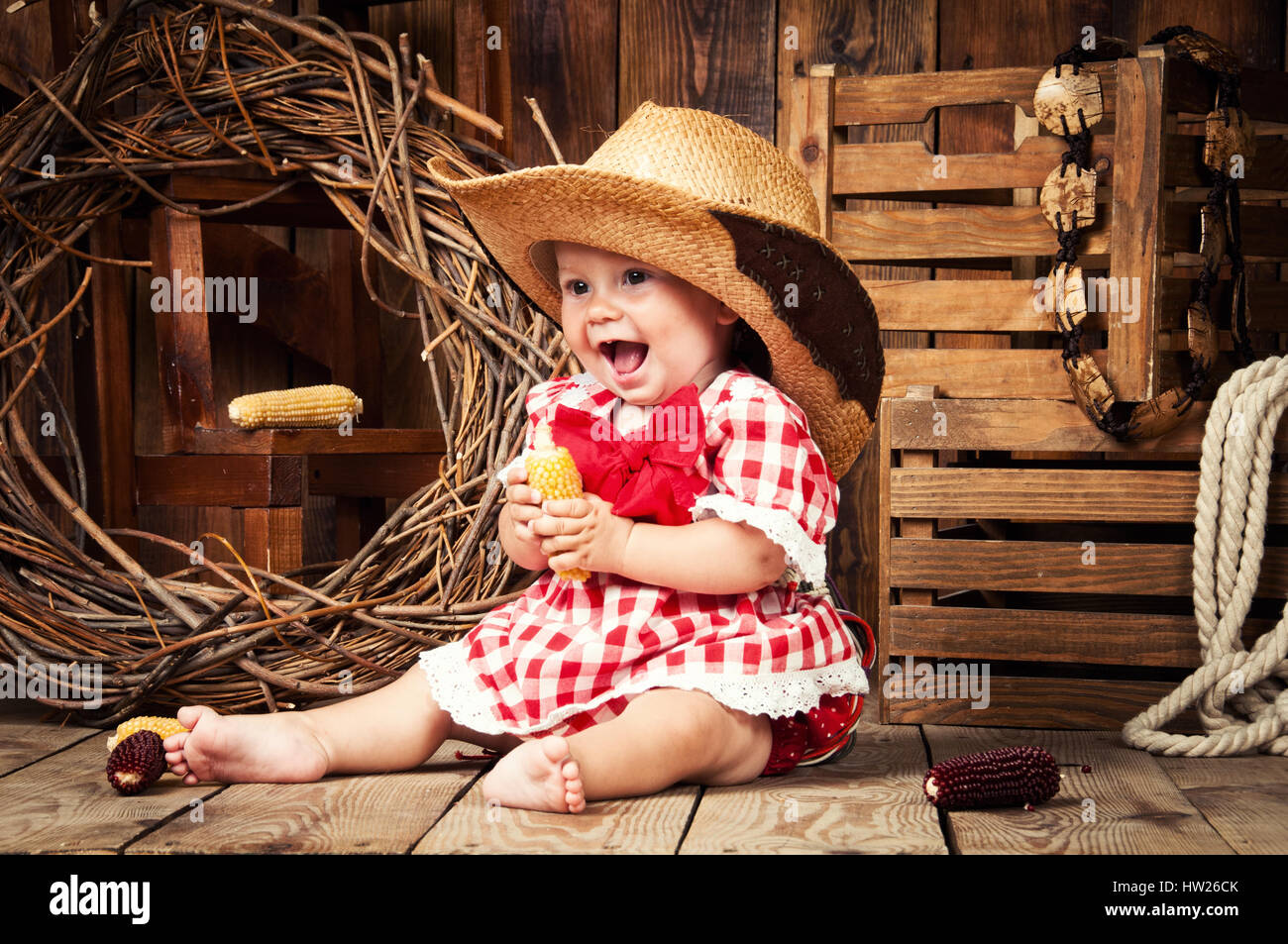Cheerful girl child dressed in country style Stock Photo Alamy