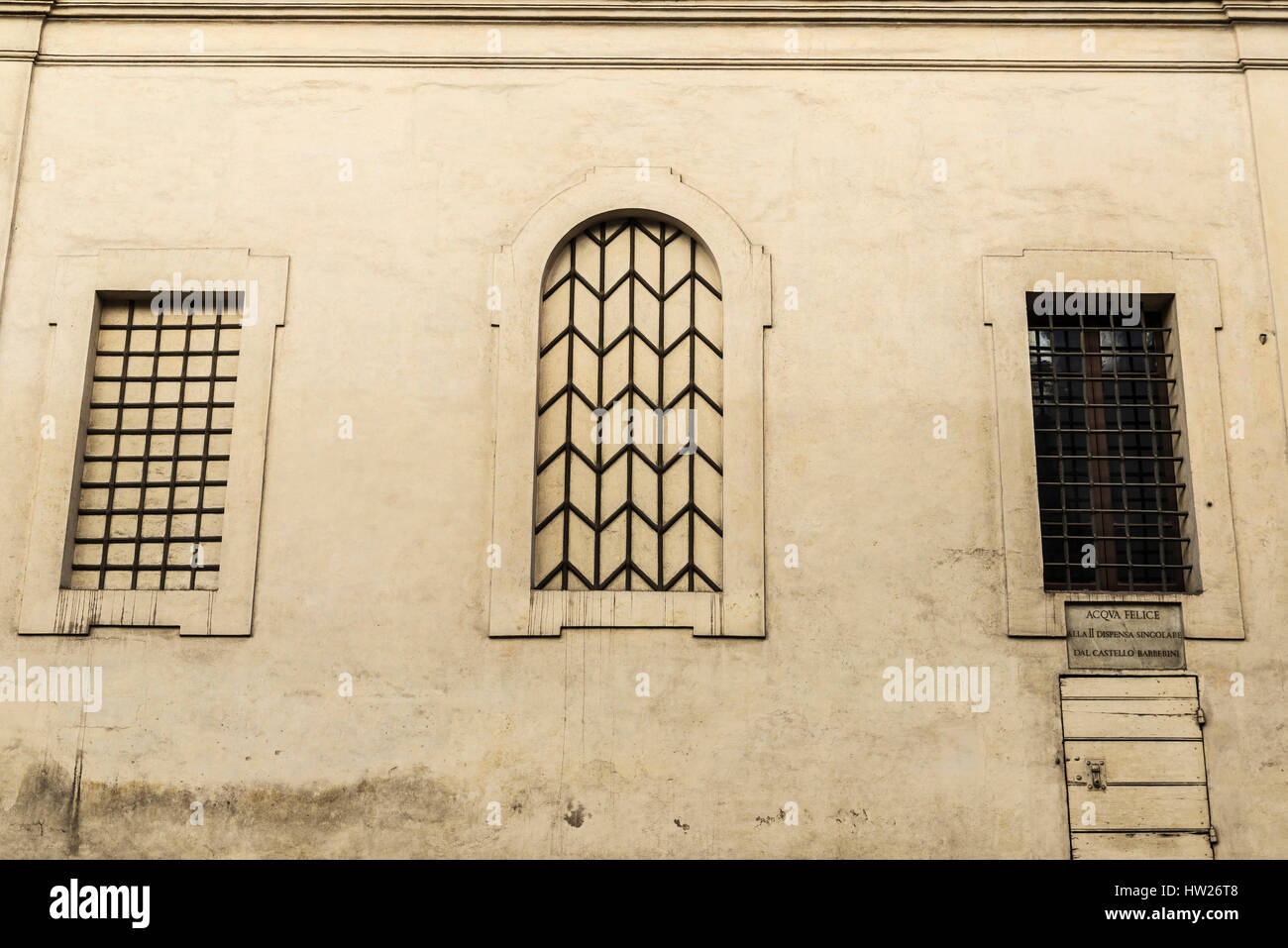 Lattice windows of an old classic decor building in the historical