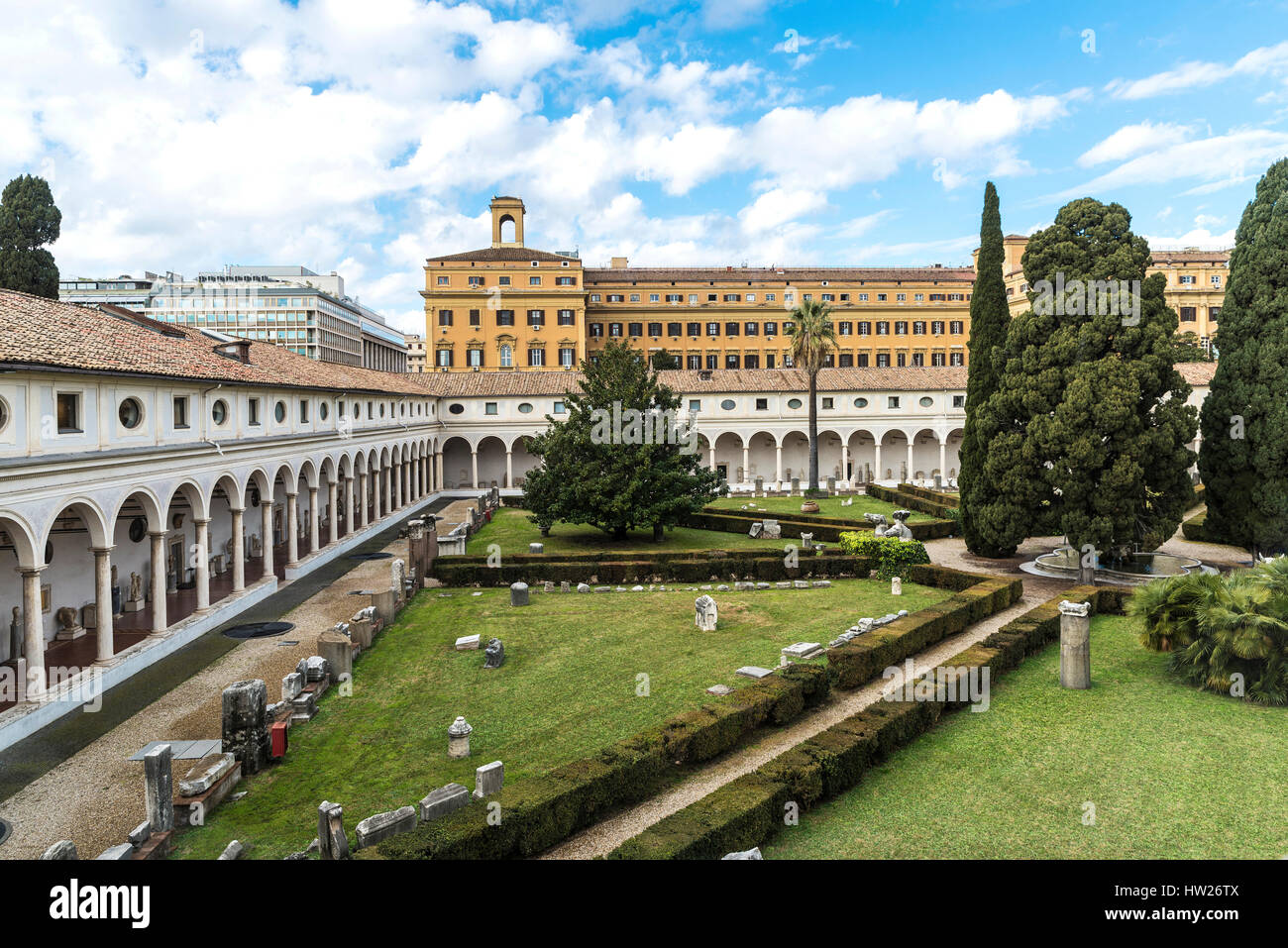 Garden of the convent cloister of Certosini with Roman ruins next to the thermal baths of Diocleziano in Rome, Italy Stock Photo