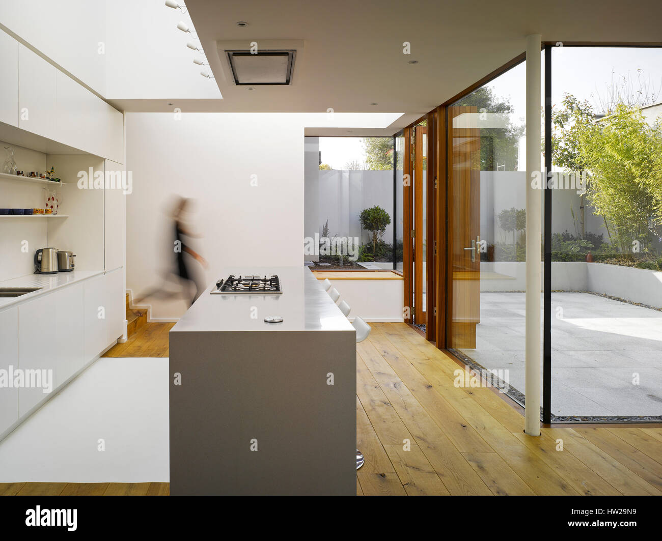 Interior View Of Kitchen Showing Roof Light Courtyard And Figure