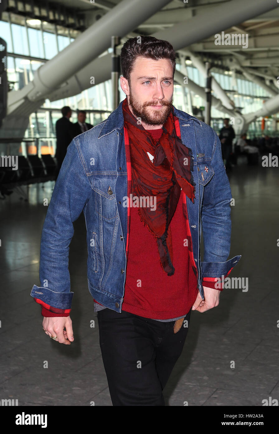 Tom Ford, Sam and Aaron Taylor-Johnson are seen at Heathrow airport after yesterday's BAFTA Ceremony  Featuring: Aaron Taylor-Johnson Where: London, United Kingdom When: 13 Feb 2017 Stock Photo