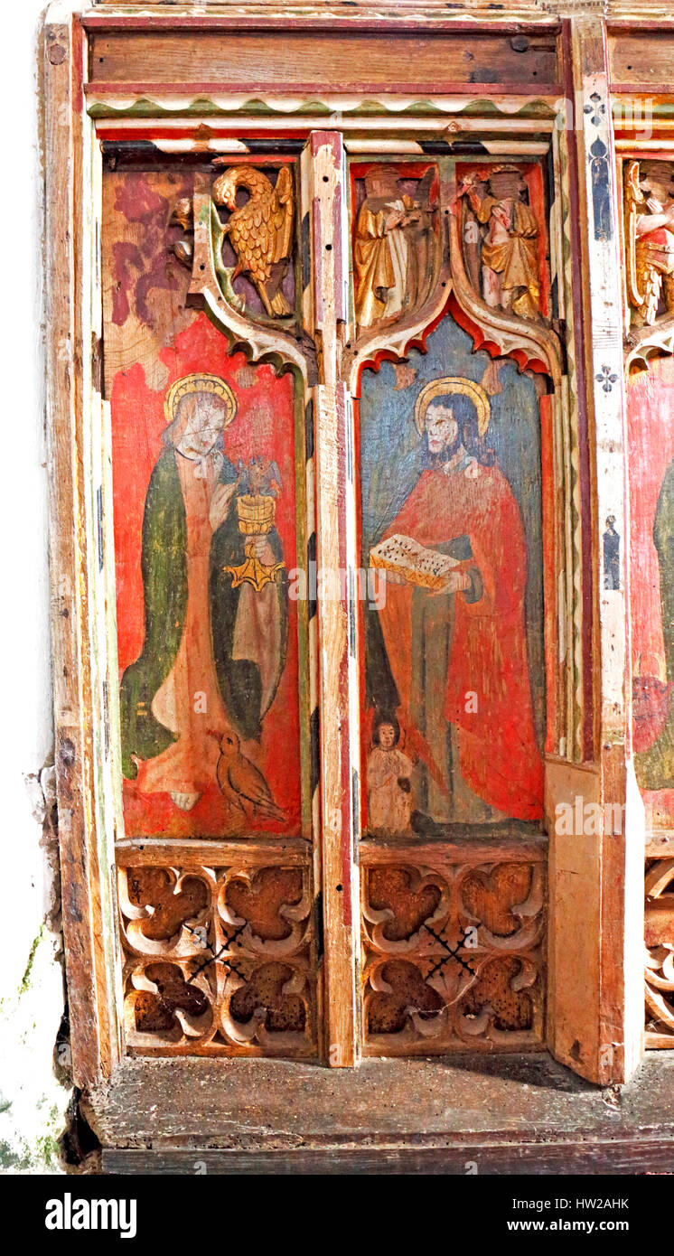 A section of old rood screen panels in the parish church of All Saints at Morston, Norfolk, England, United Kingdom. Stock Photo