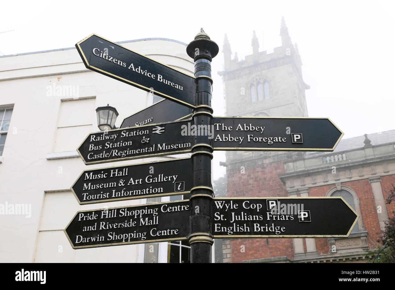 Signs on signnpost with directions to tourist sites and places of interest in the town centre of Shrewsbury, Shropshire, England  UK  KATHY DEWITT Stock Photo