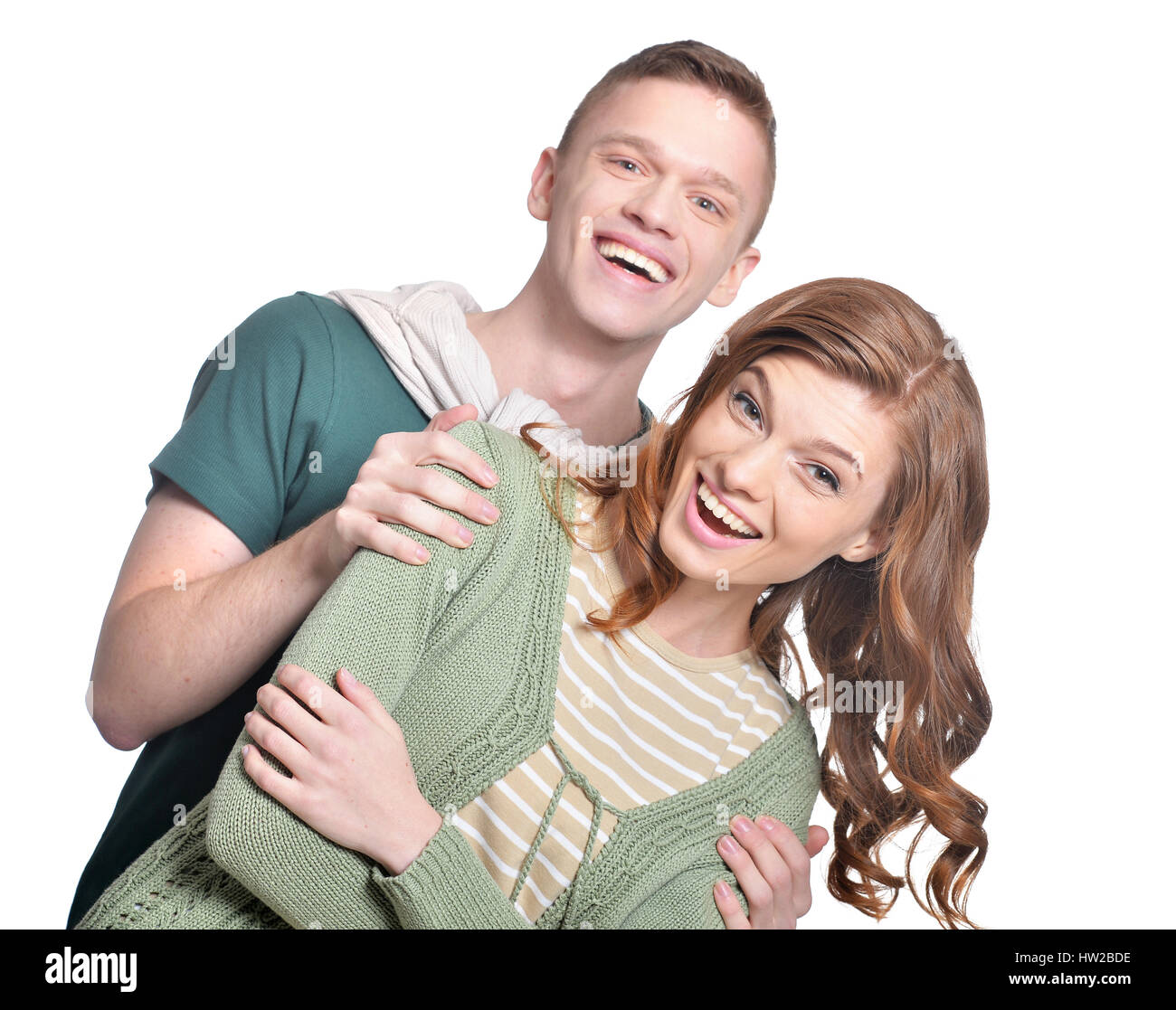 Beautiful young couple on a white background Stock Photo - Alamy