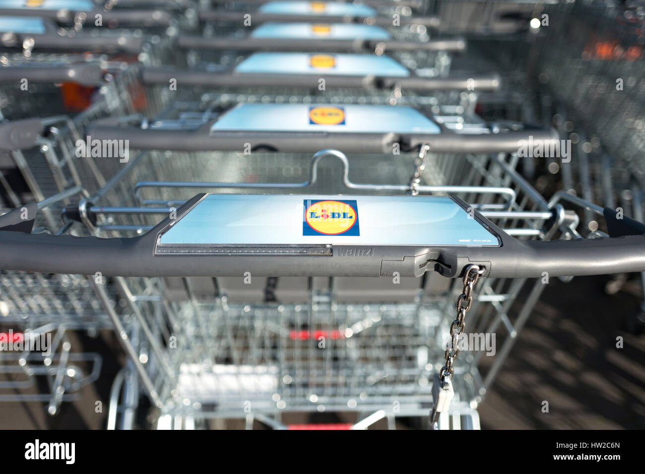 Lidl sign at shopping carts made by Wanzl. Lidl is the largest discount supermarket chain in Europe. Stock Photo