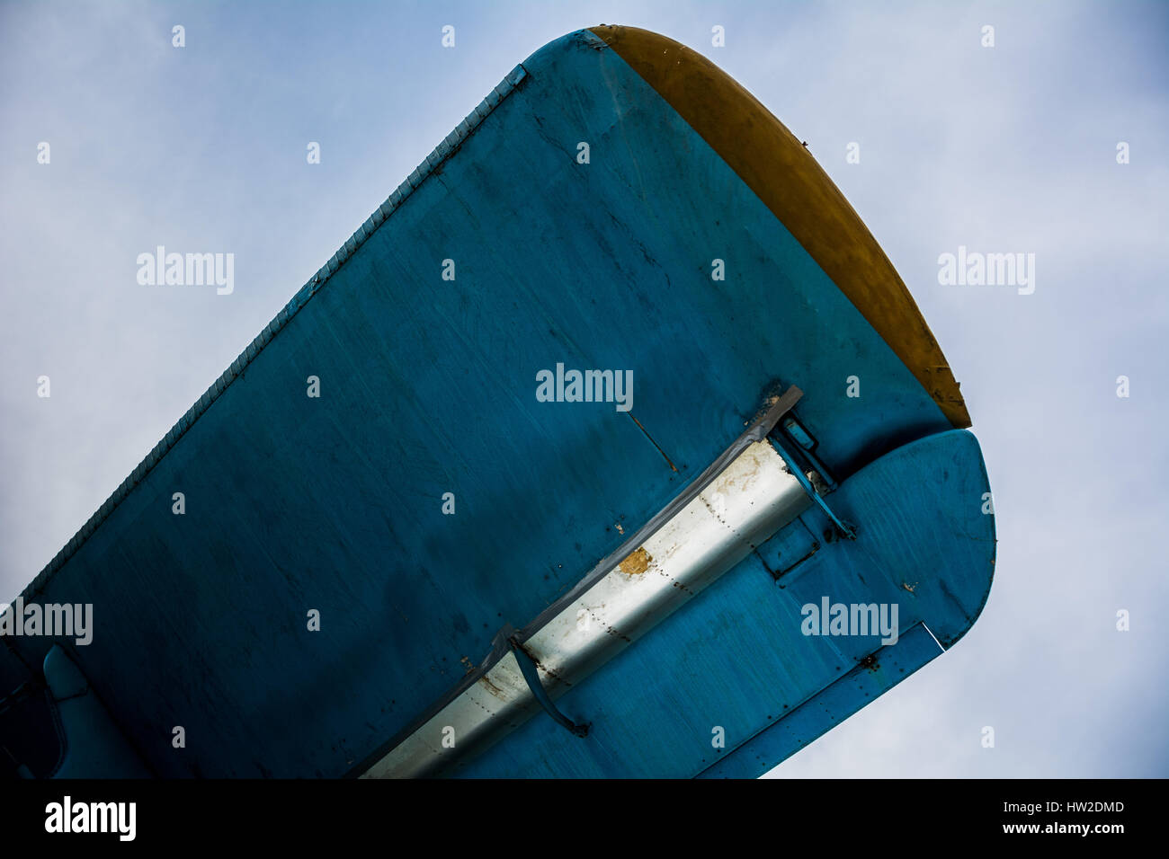 The wing of the Soviet AN-2 aircraft against the cloudy sky Stock Photo